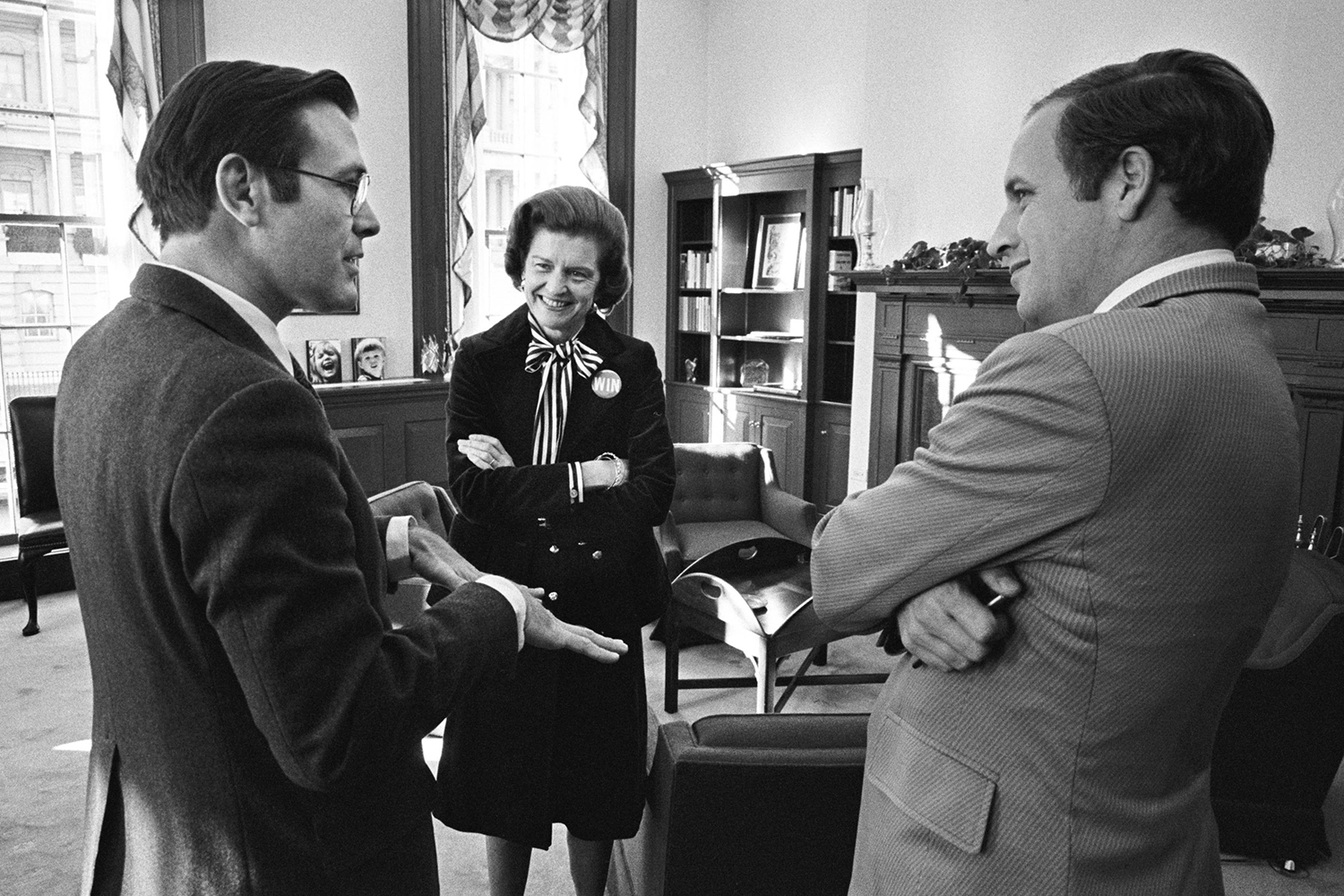 Dick Cheney talks with Donald Rumsfeld and Betty Ford.