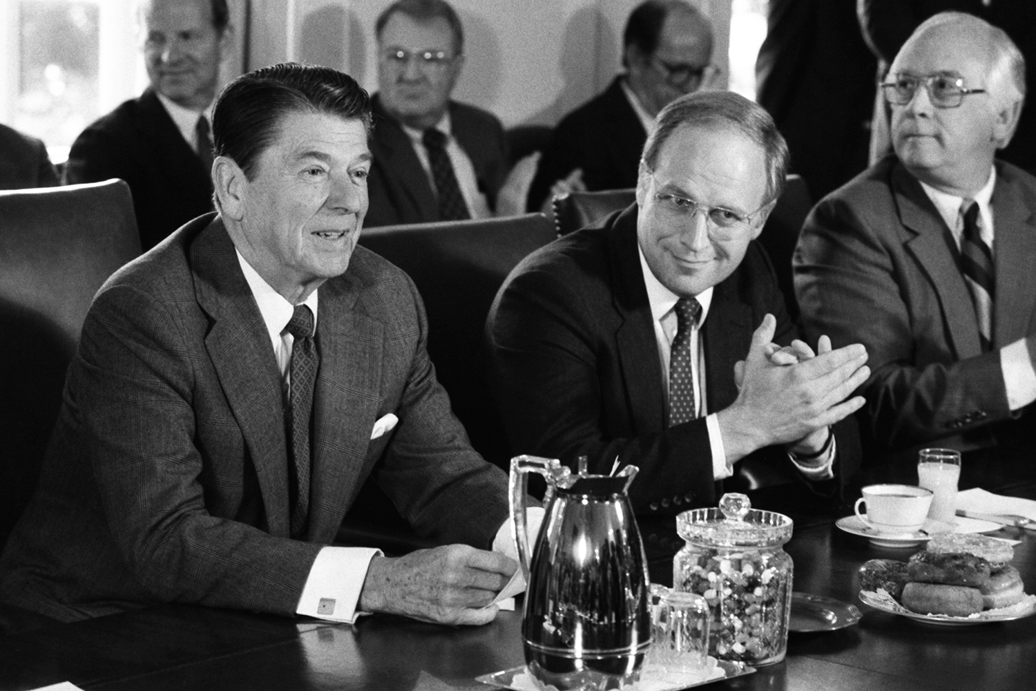 Dick Cheney listens to Ronald Reagan.