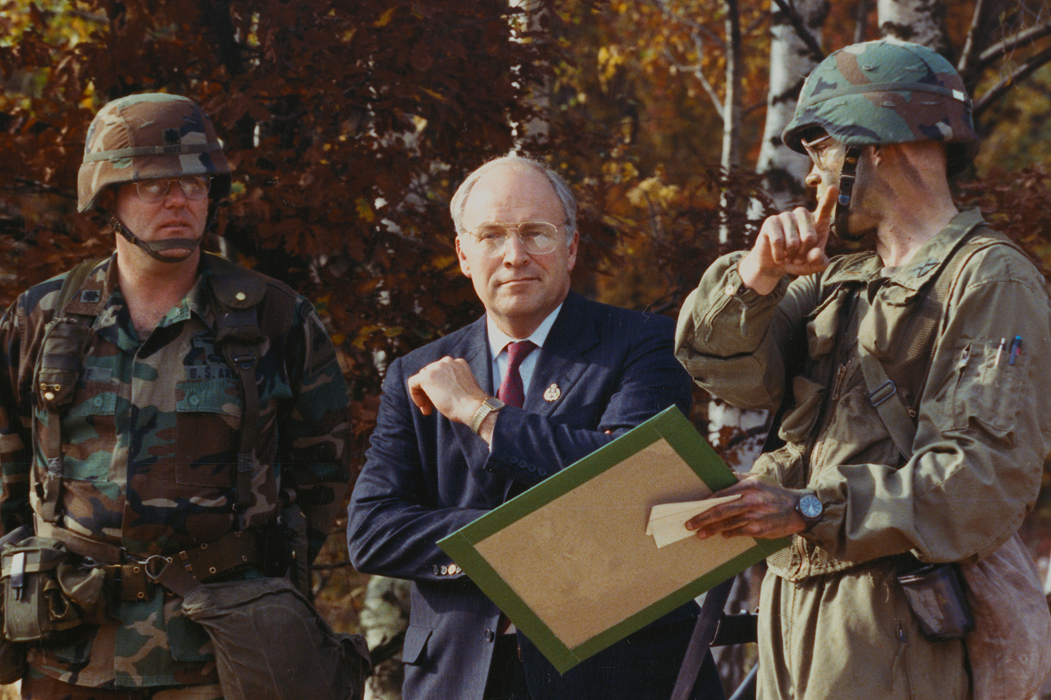 Dick Cheney listens to soldiers.
