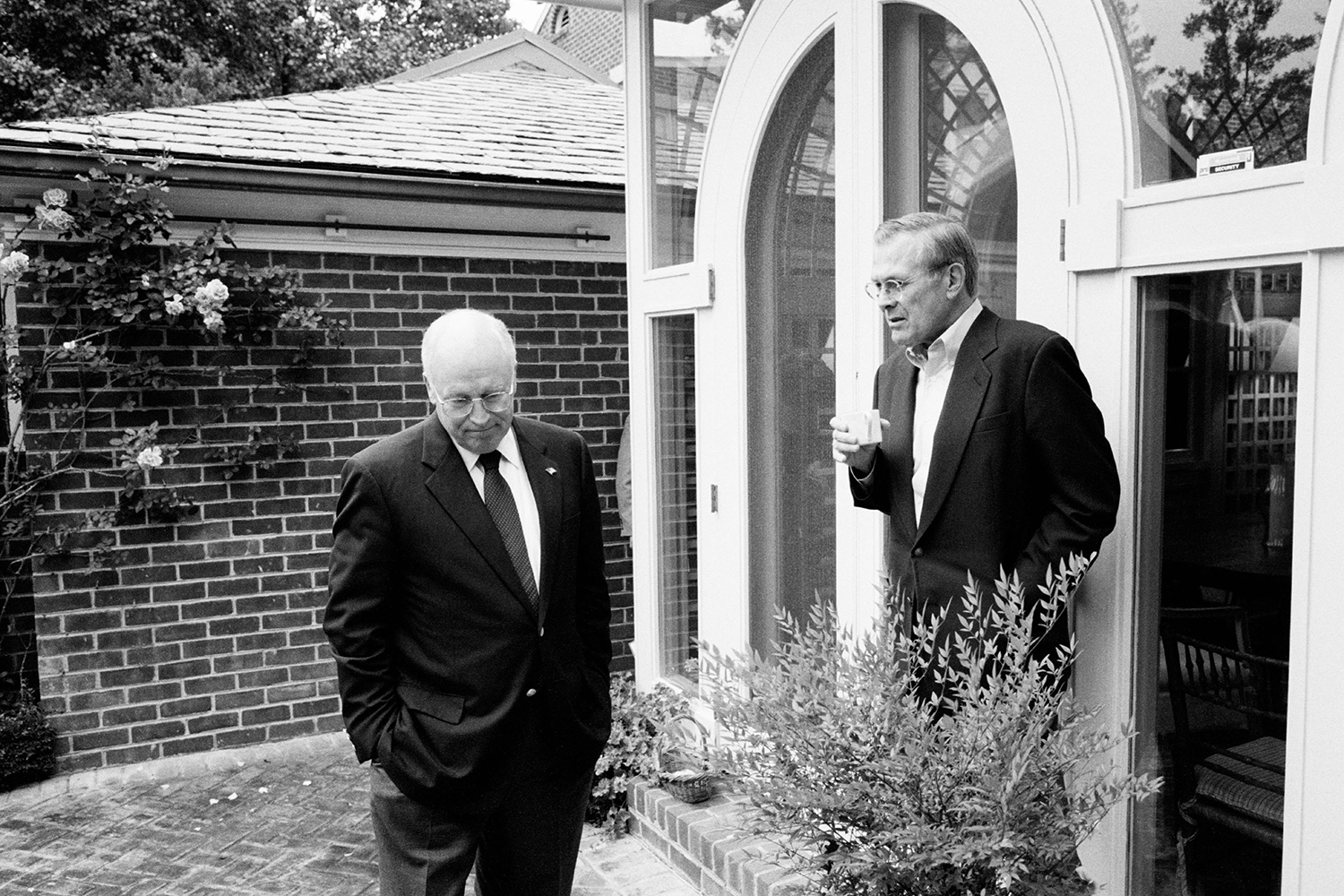 Dick Cheney talks with Donald Rumsfeld.