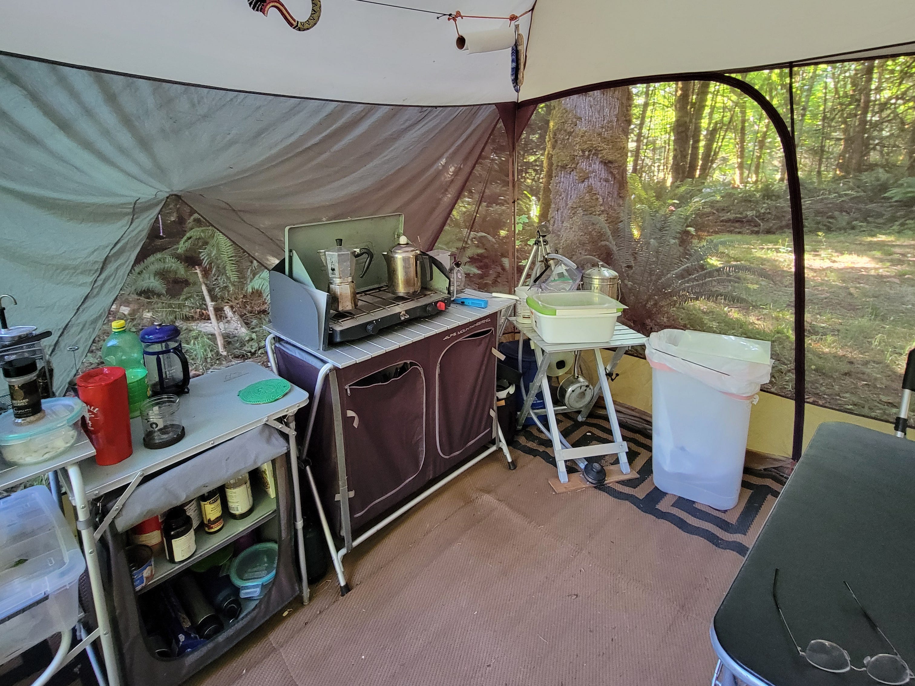 Tent with kitchen supplies inside