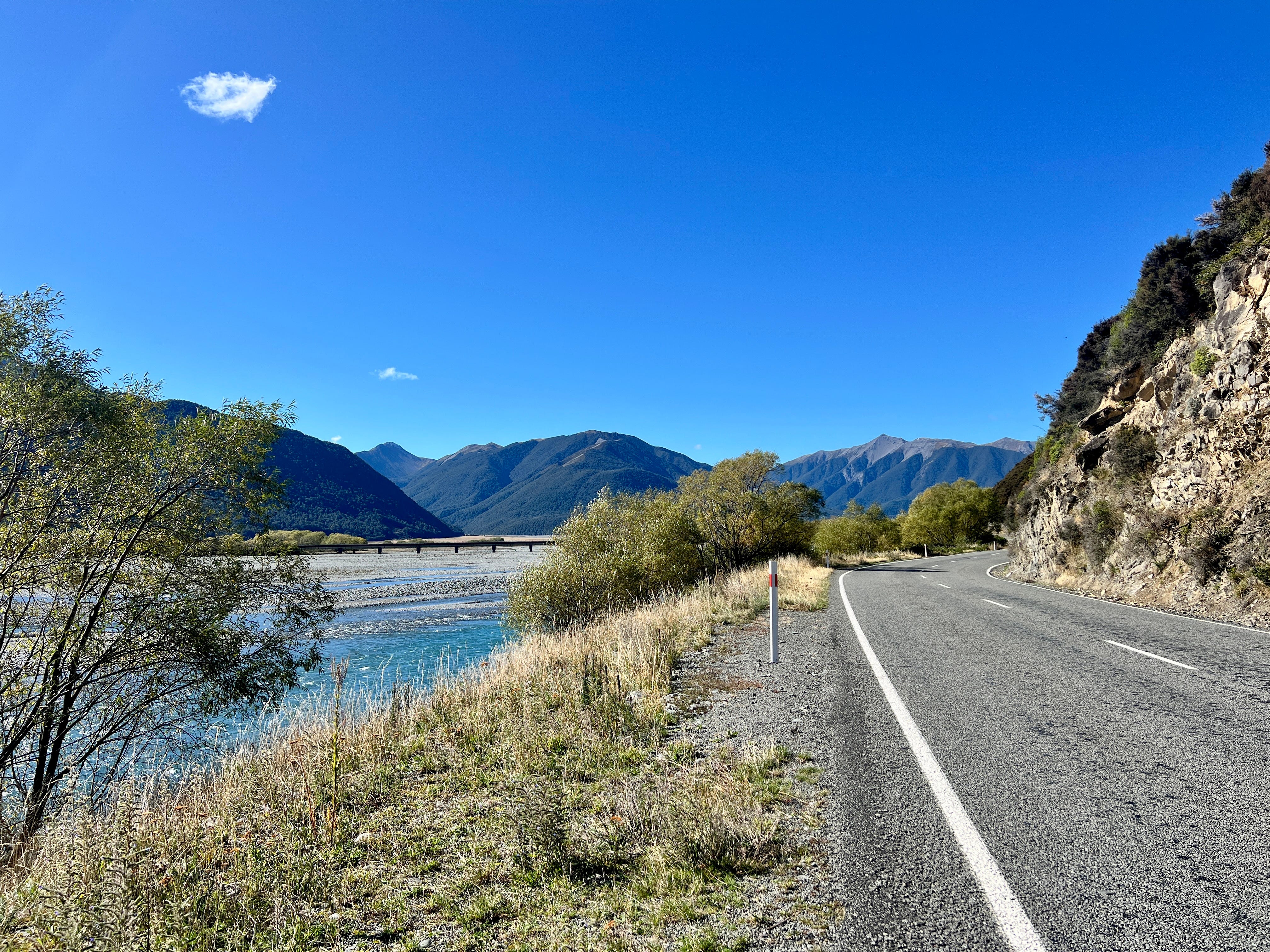 View of water, road, mountains in New Zealand