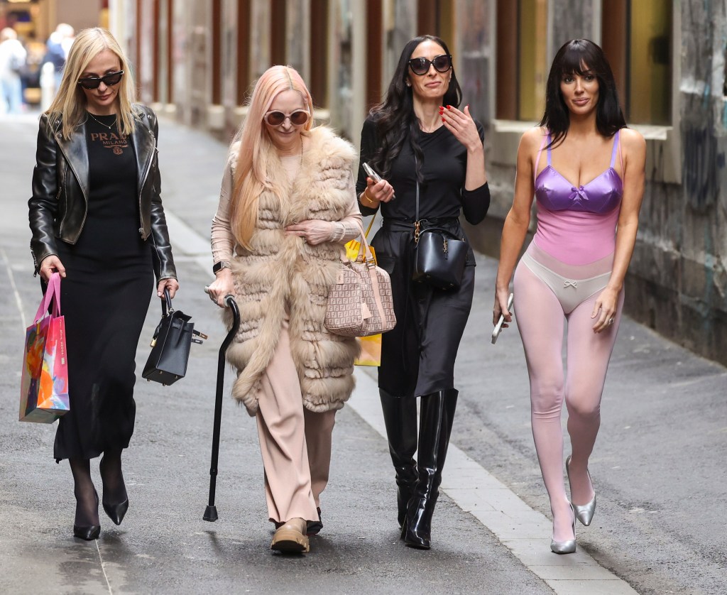 Bianca Censori, her mother Alexandra, and two other women walk together.