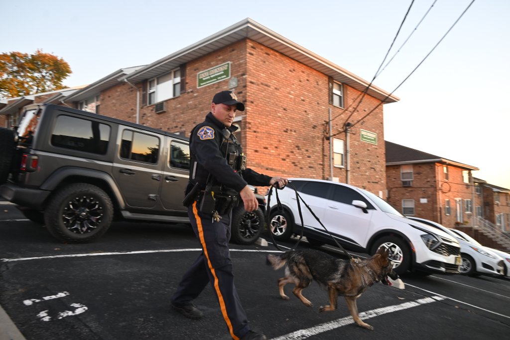 A police officer and a K9 unit respond to a bomb threat at Columbus Elementary School.