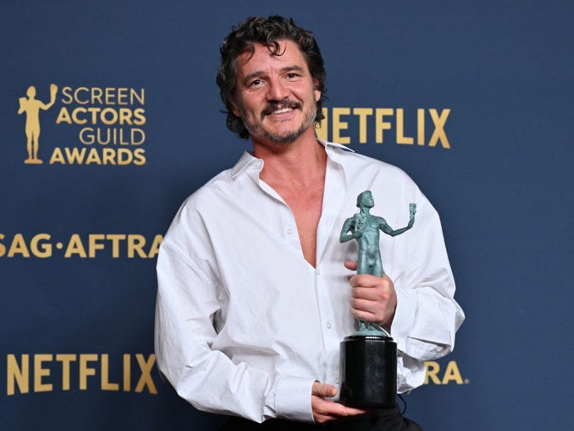 Chilean-US actor Pedro Pascal poses in the press room with the award for Outstanding Performance by a Male Actor in a Drama Series for 