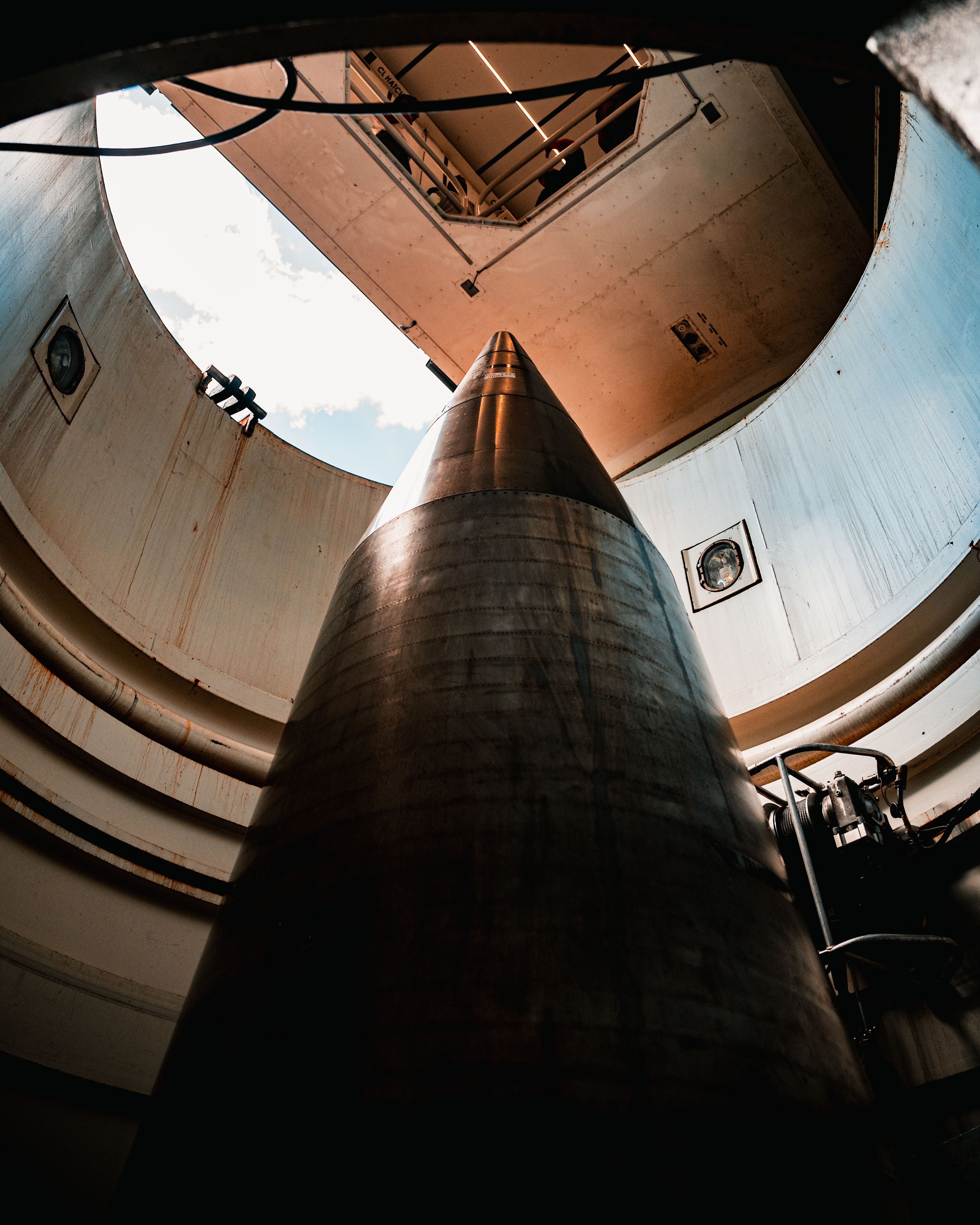 An unarmed Minuteman III intercontinental ballistic missile sits in a silo.