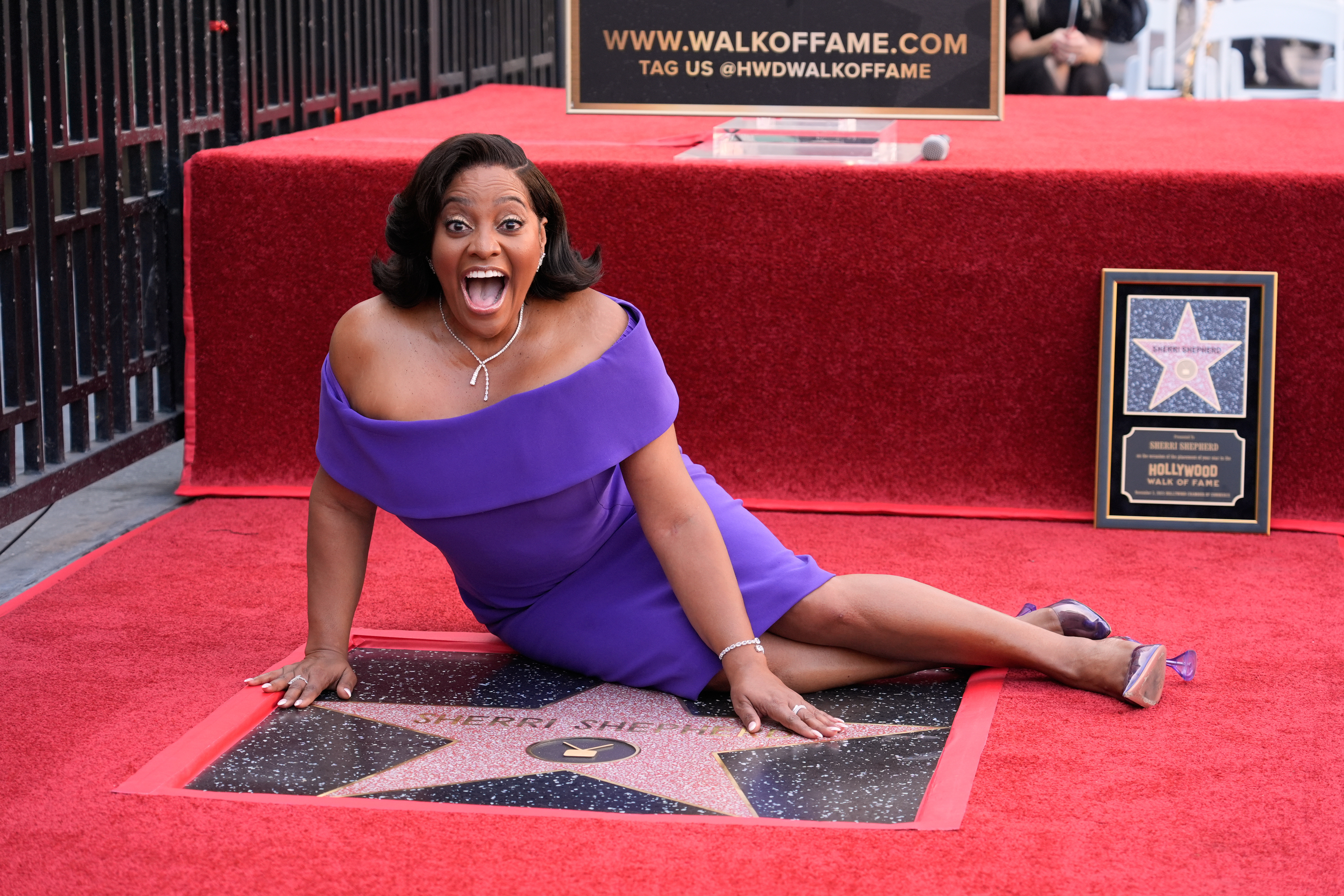 Sherri Shepherd poses with her star on the Hollywood Walk of Fame in Los Angeles.