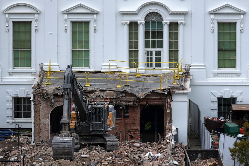 An excavator sits on the rubble after the East Wing of the White House was demolished on October 28, 2025 in Washington, DC.