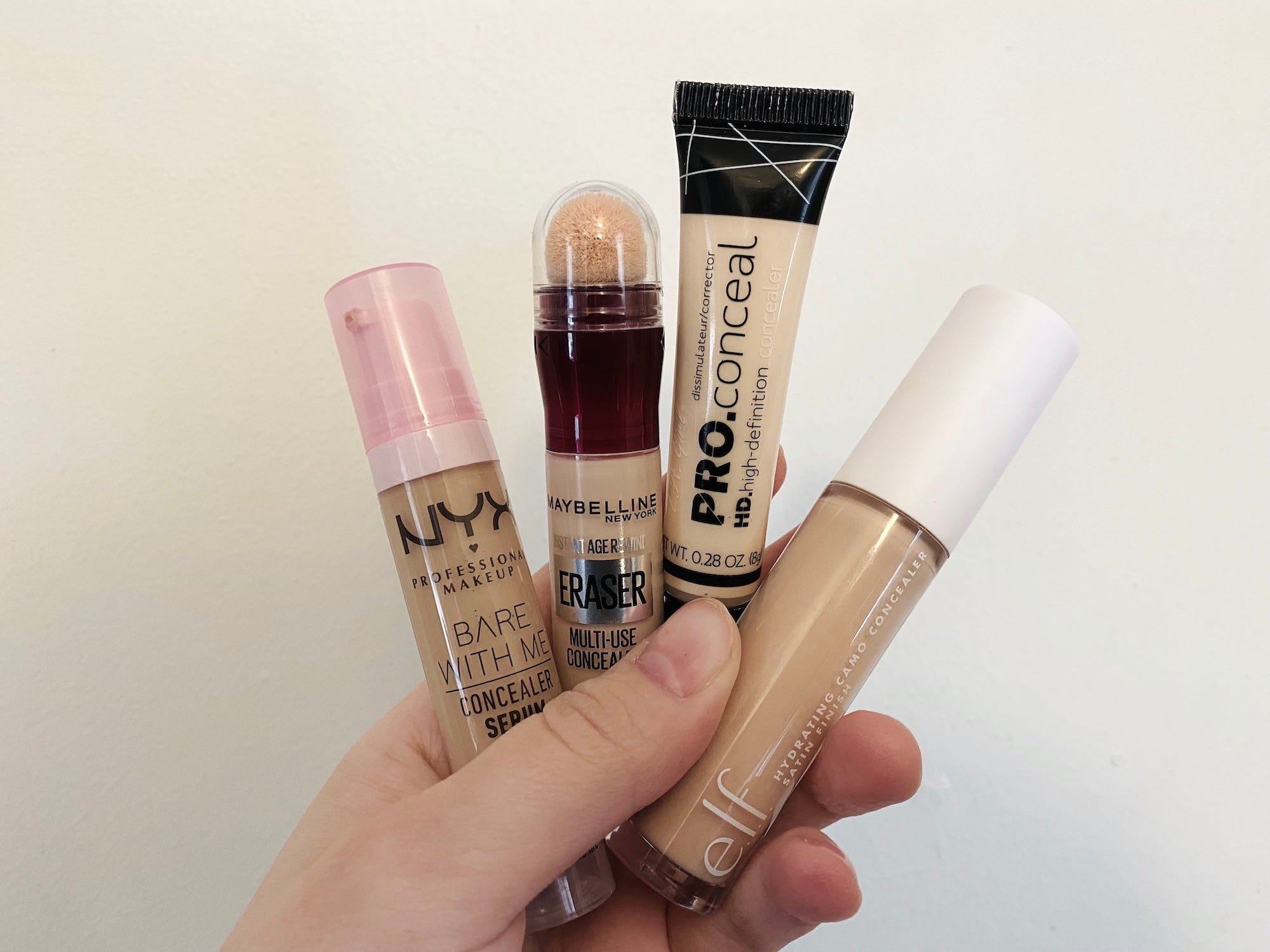 Four concealers that TikTokers love. From left to right, NYX, Maybelline, LA Girl, and e.l.f. cosmetics.
