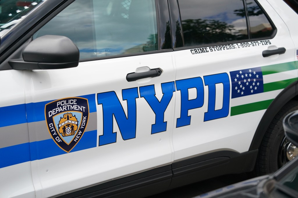 A general view of an NYPD police car with a thin blue line design or blue lives matter design as seen outside of the 44th precinct station house located at 2 E169th Street in the Bronx, NY on June 27, 2024.