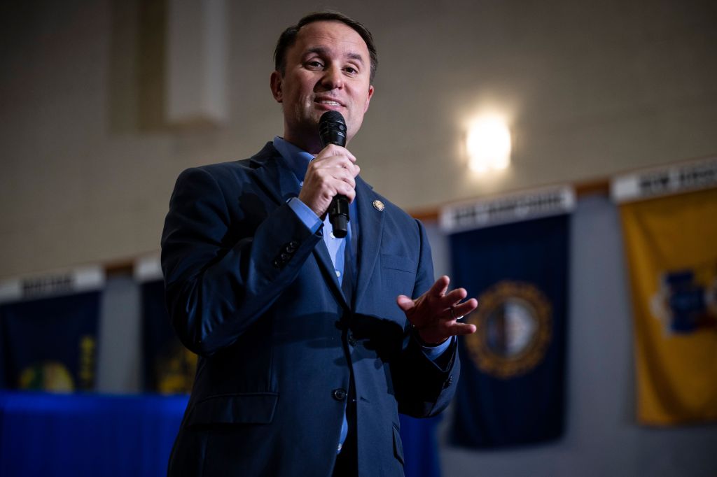 Virginia Attorney General Jason Miyares speaking into a microphone.