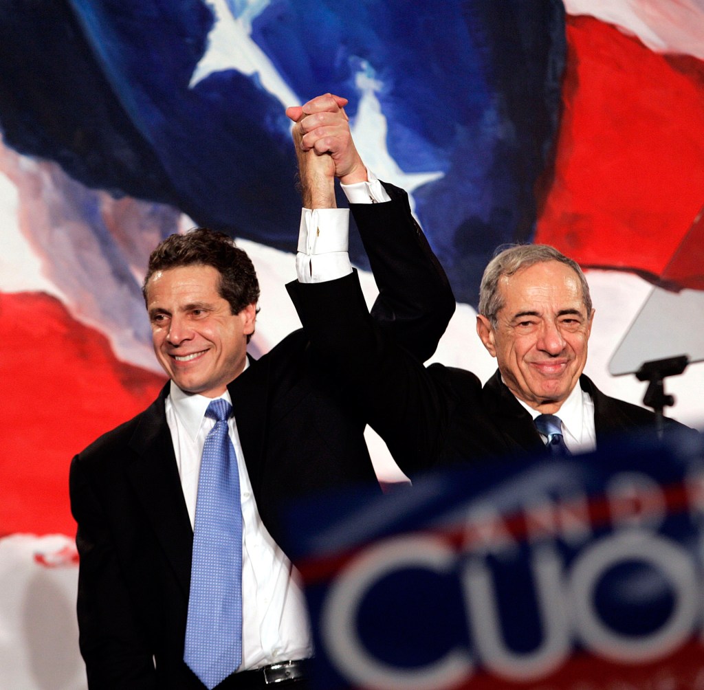 NY Attorney general-elect Andrew Cuomo celebrates his election with his father, former NY Gov. Mario Cuomo, on Nov. 7, 2006.