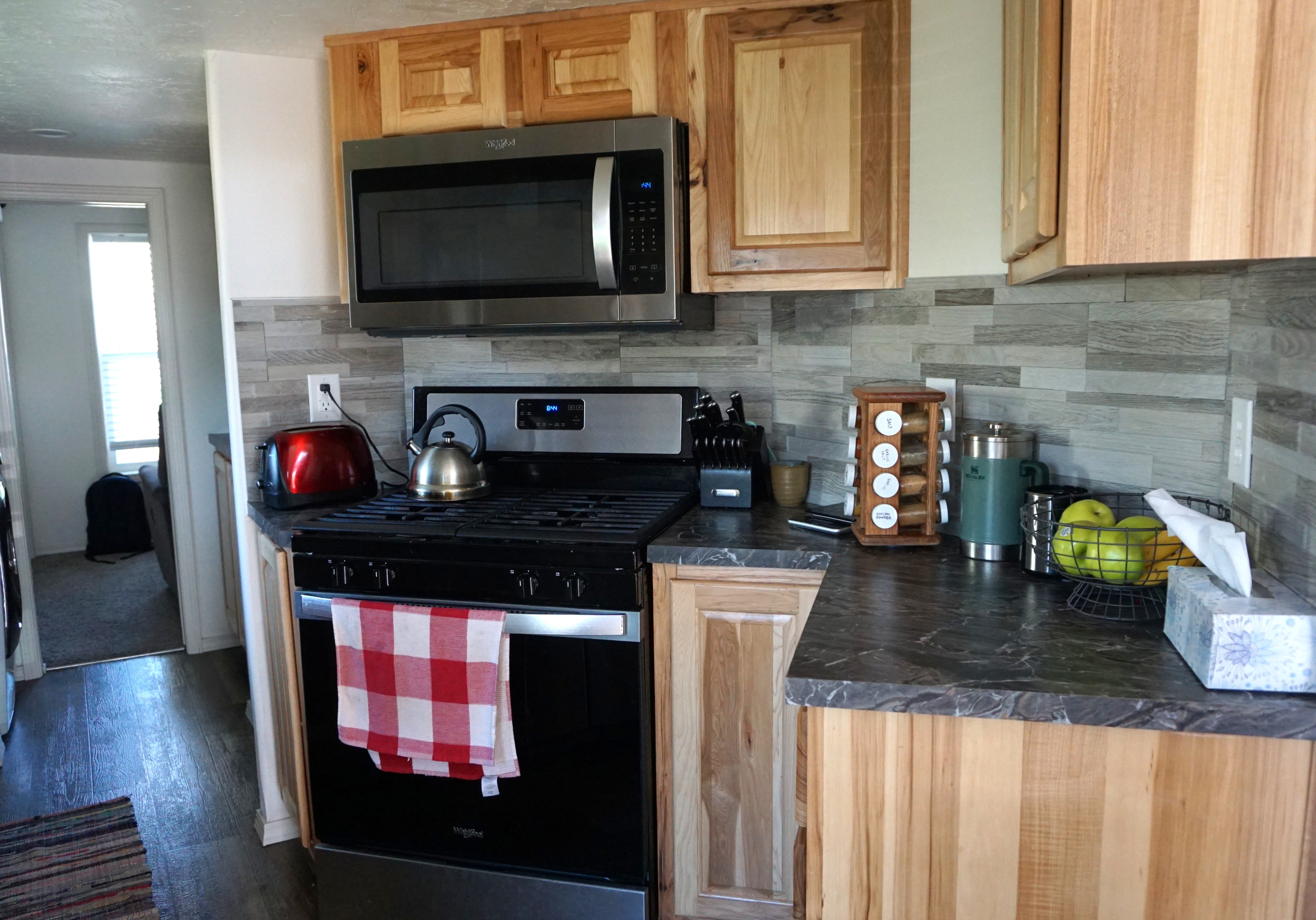 Small kitchen with limited counterspace in tiny home