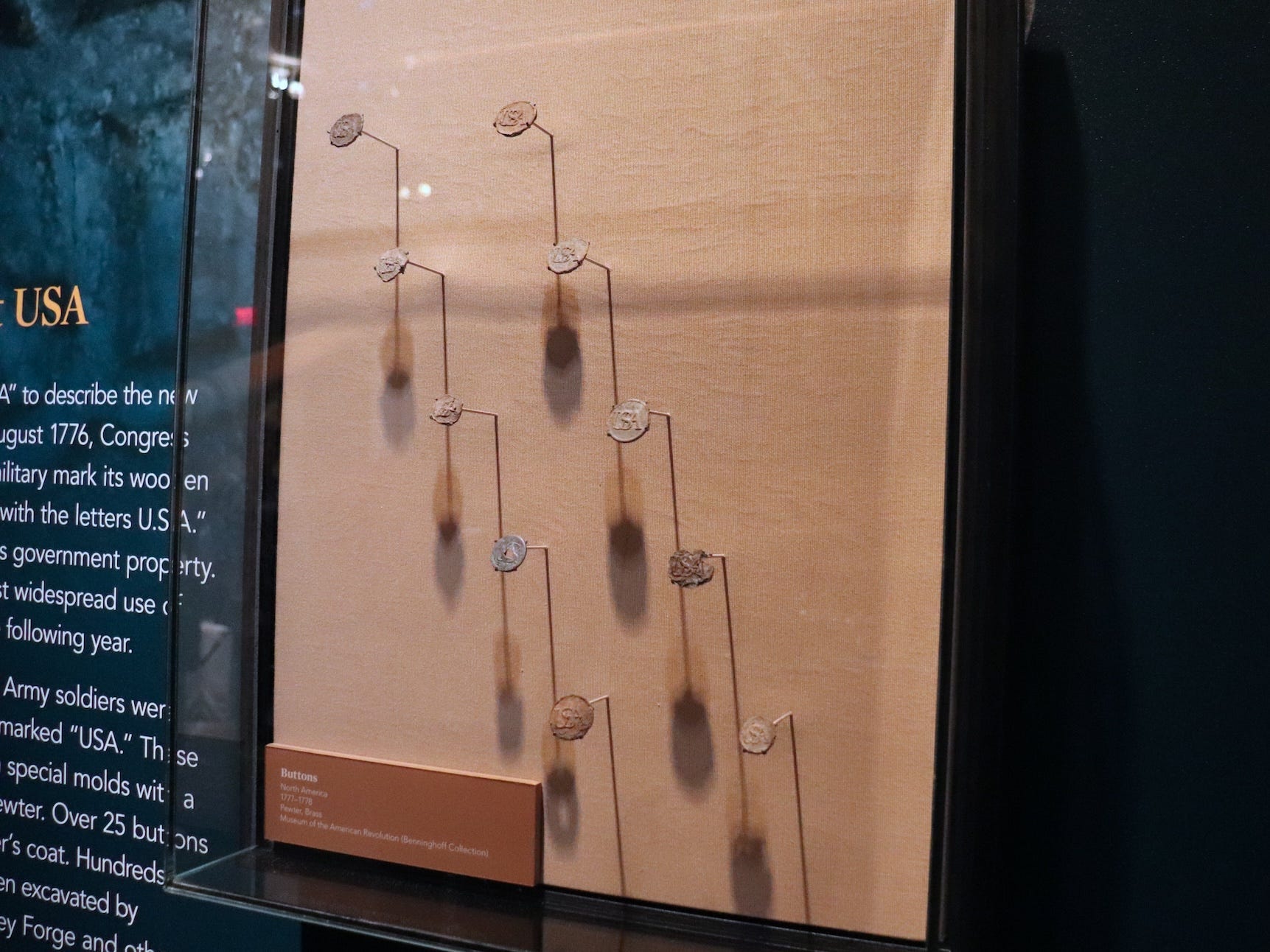 Pewter buttons at the Museum of the American Revolution.