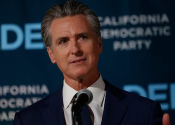 Gavin Newsom Torches Trump’s Tacky ‘Oval Office’ Sign