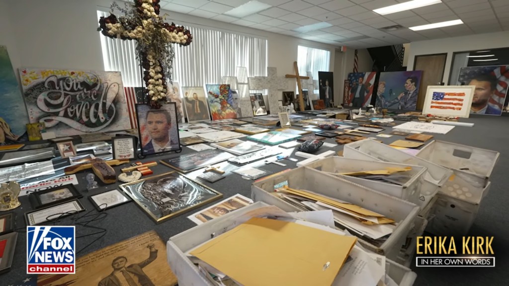 An office room filled with portraits, crosses, and other mementos for Charlie Kirk.