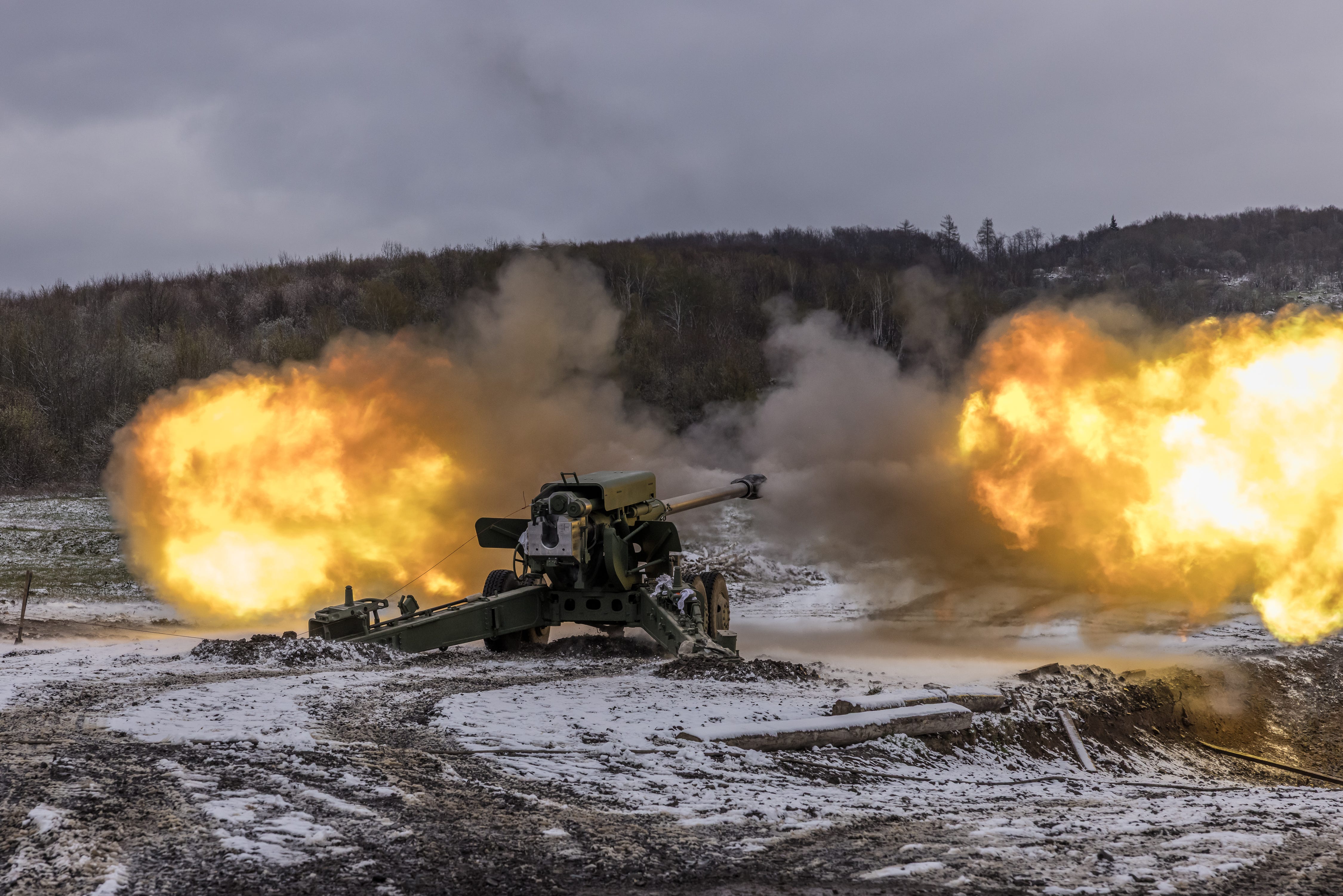 A howitzer fires a shell in Western Ukraine.