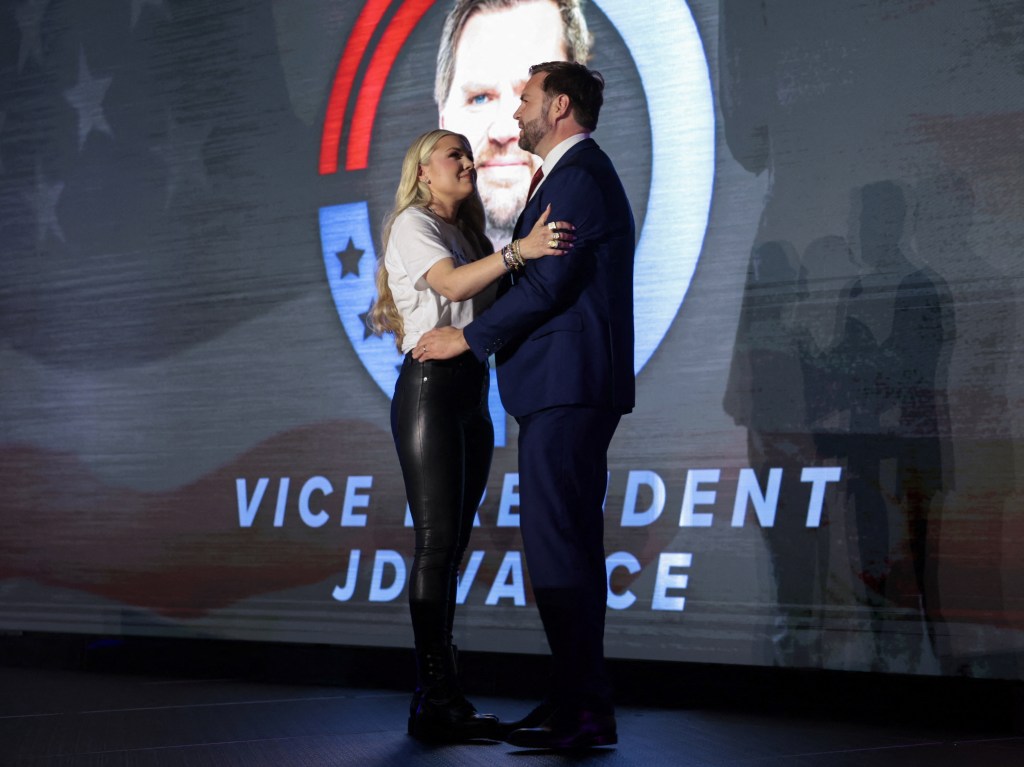 Charlie Kirk's widow, Erika Kirk, greets Vice President JD Vance during a Turning Point USA event.