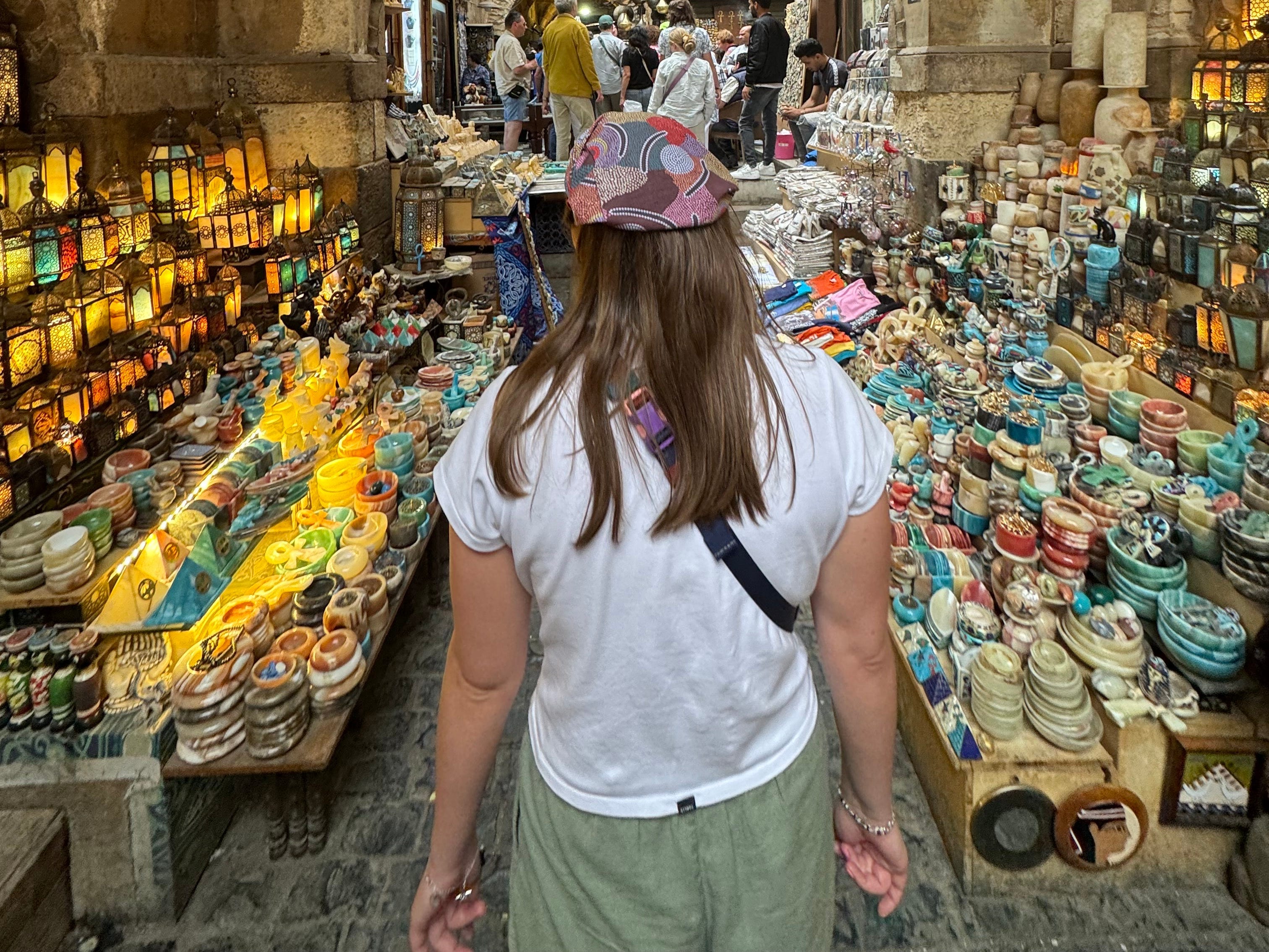 Hannah walks through a market in Egypt.