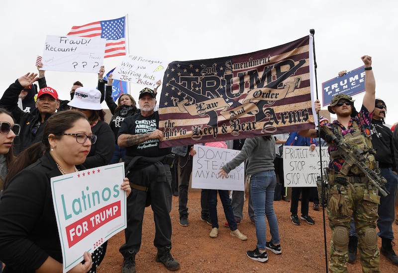 NORTH LAS VEGAS, NEVADA - NOVEMBER 07: Supporters of President Donald Trump protest outside the Clark County Election Department on November 7, 2020 in North Las Vegas, Nevada. Around the country, supporters of presidential candidate Joe Biden are taking to the streets to celebrate after news outlets have declared Democratic presidential nominee Joe Biden winner over President Donald Trump in the U.S. Presidential race. (Photo by Ethan Miller/Getty Images)