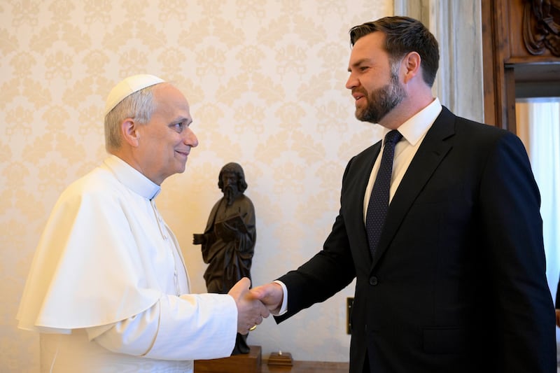 Pope Leo XIV shakes JD Vance's hand at the Vatican on May 19.