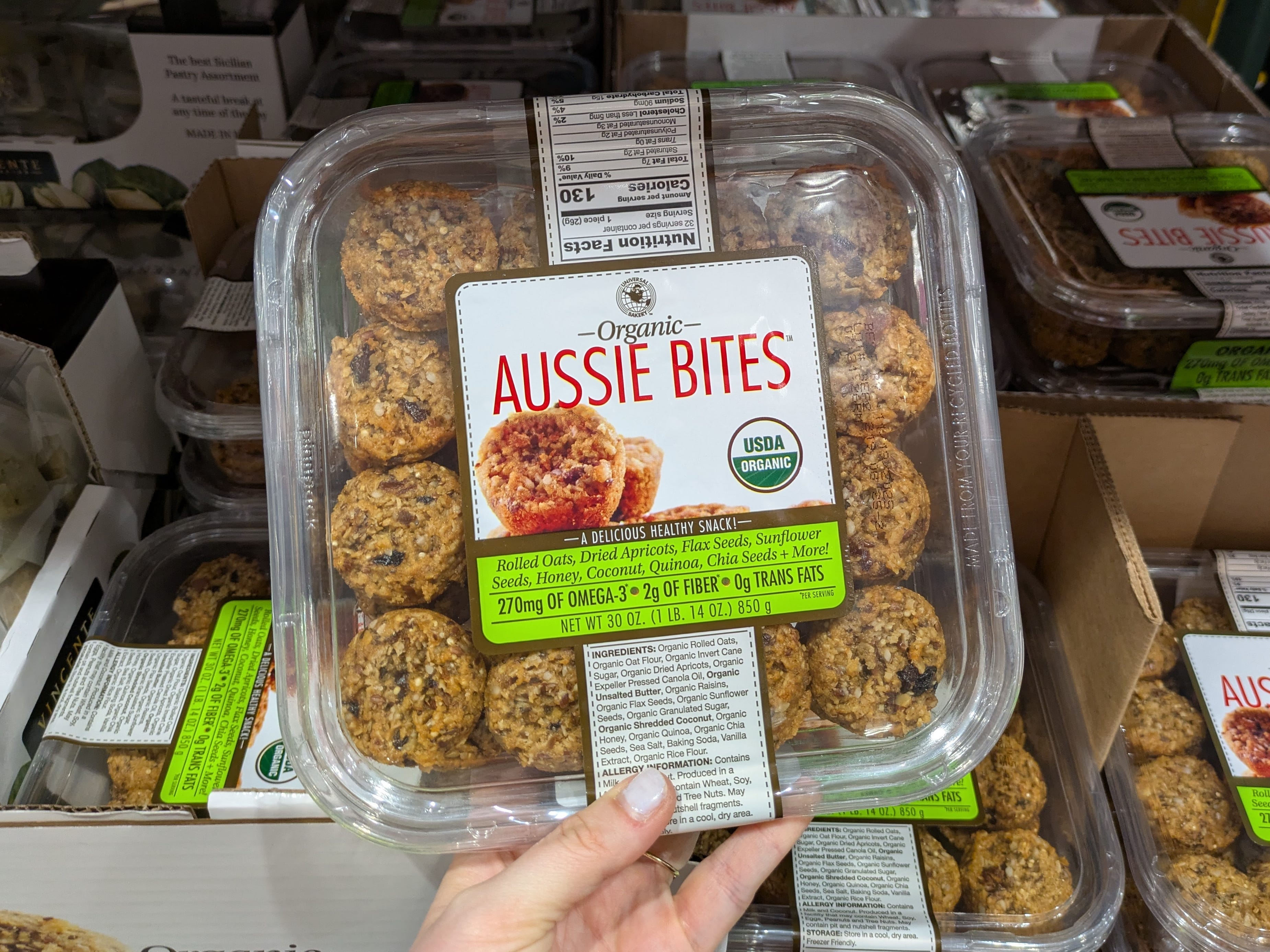 The author holding a package of Aussie Bites.
