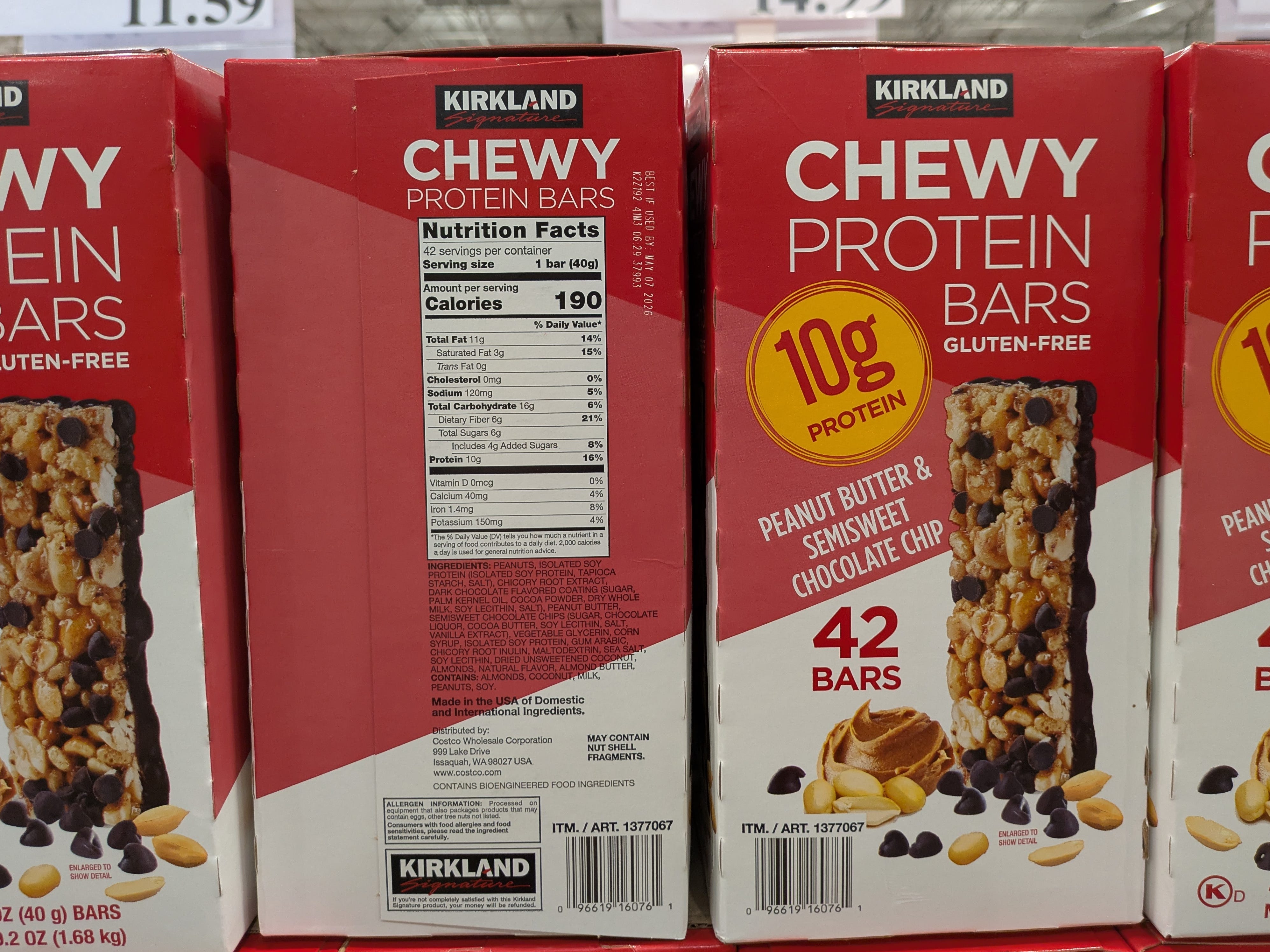 Boxes of Kirkland Signature chewy protein bars.