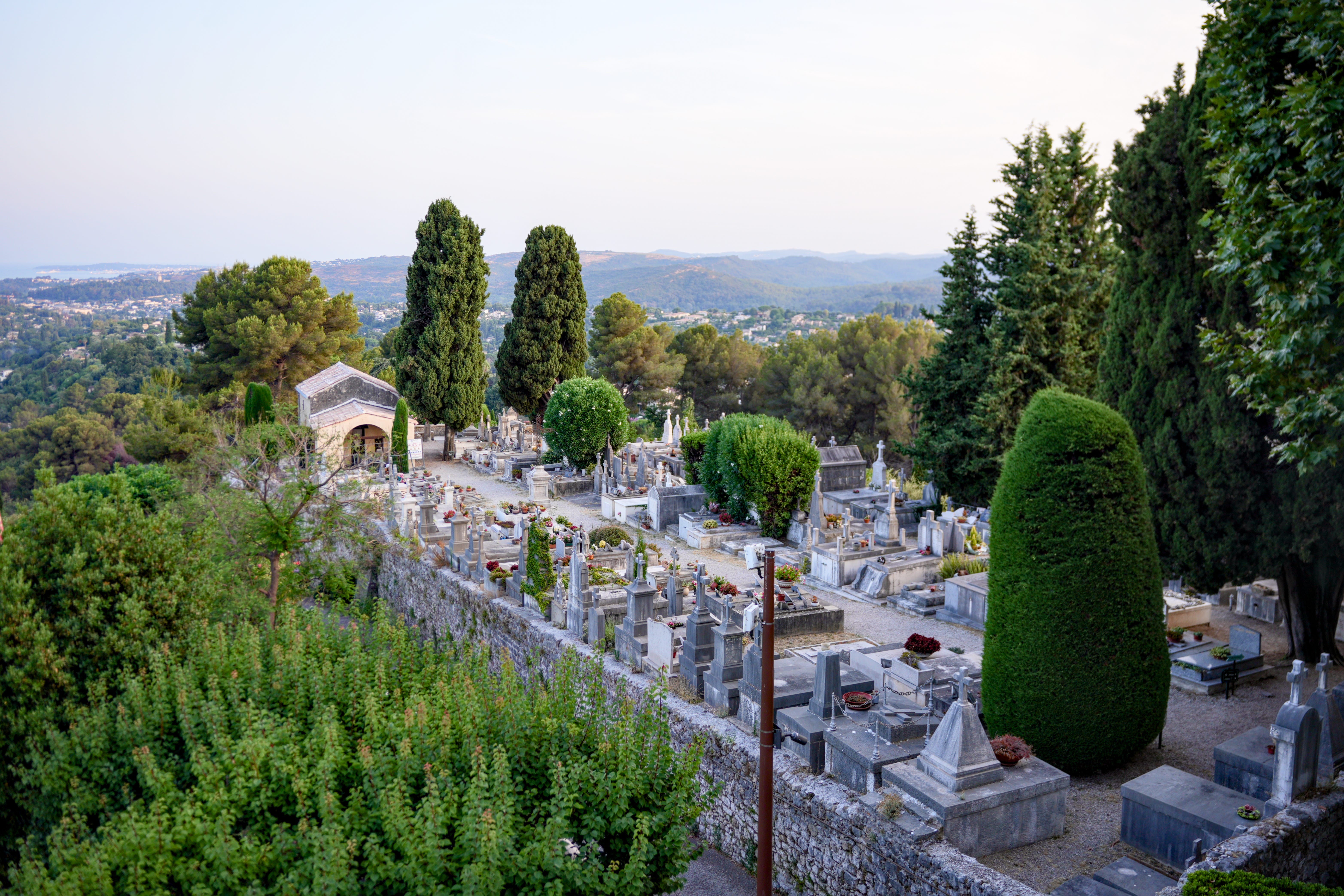 Historic cemetery with graves and cypress trees in Saint Paul de Vence Provence France