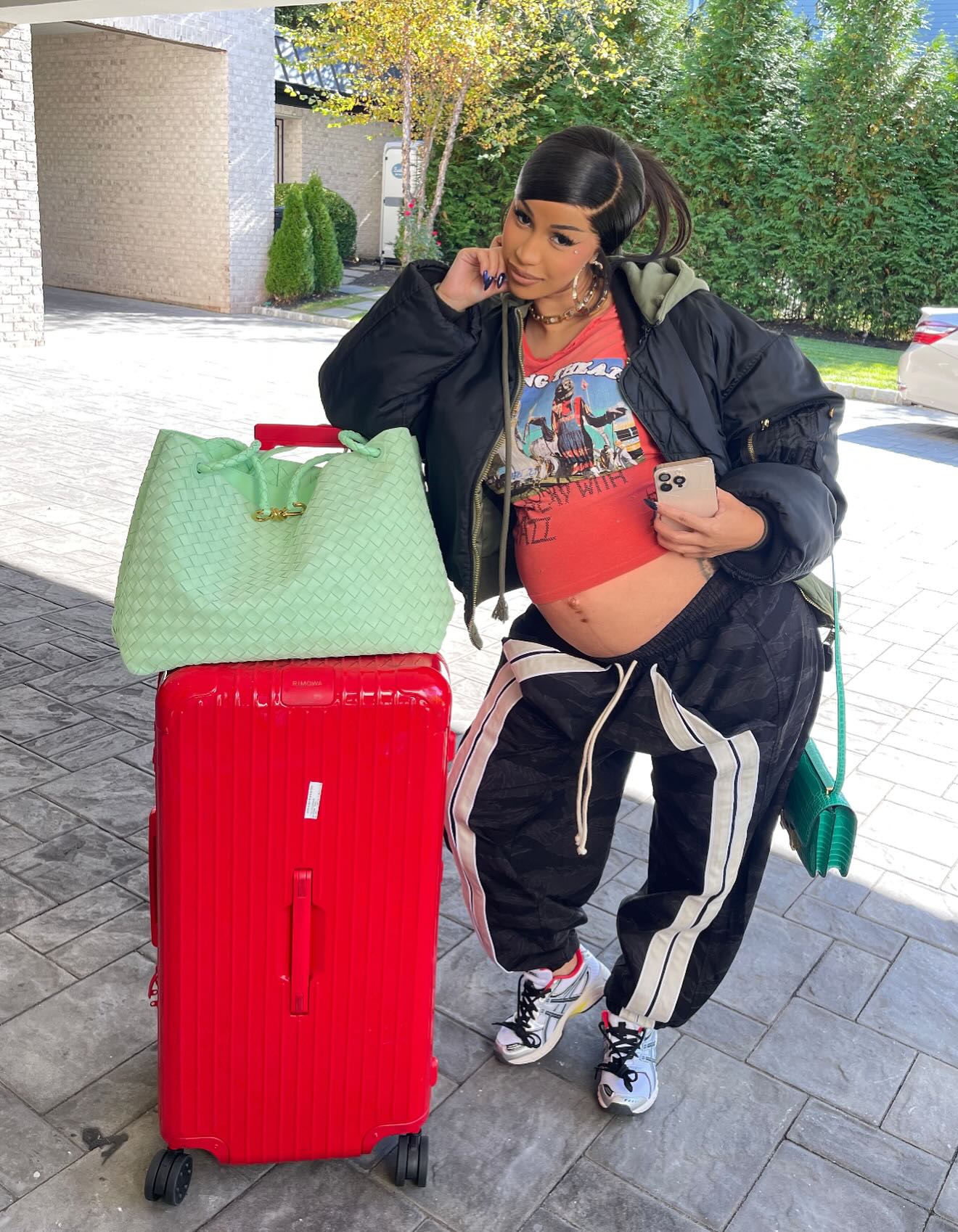 Cardi B shows off her baby bump.
