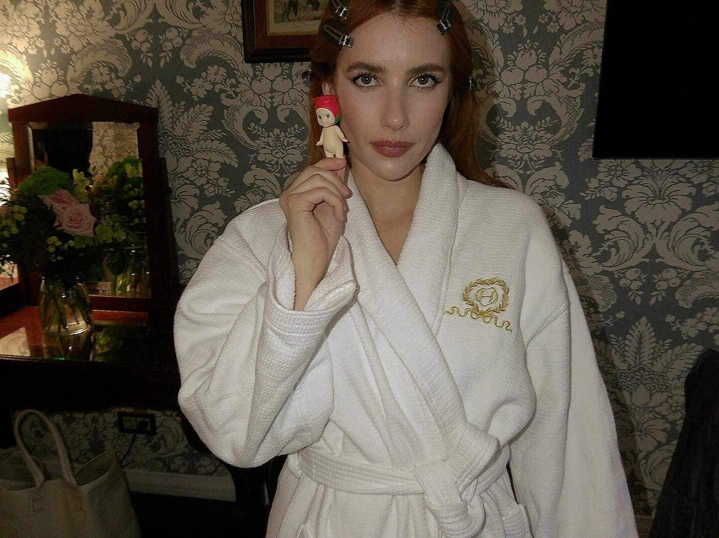 Emma Roberts shows off her Sonny Angel in Madrid.