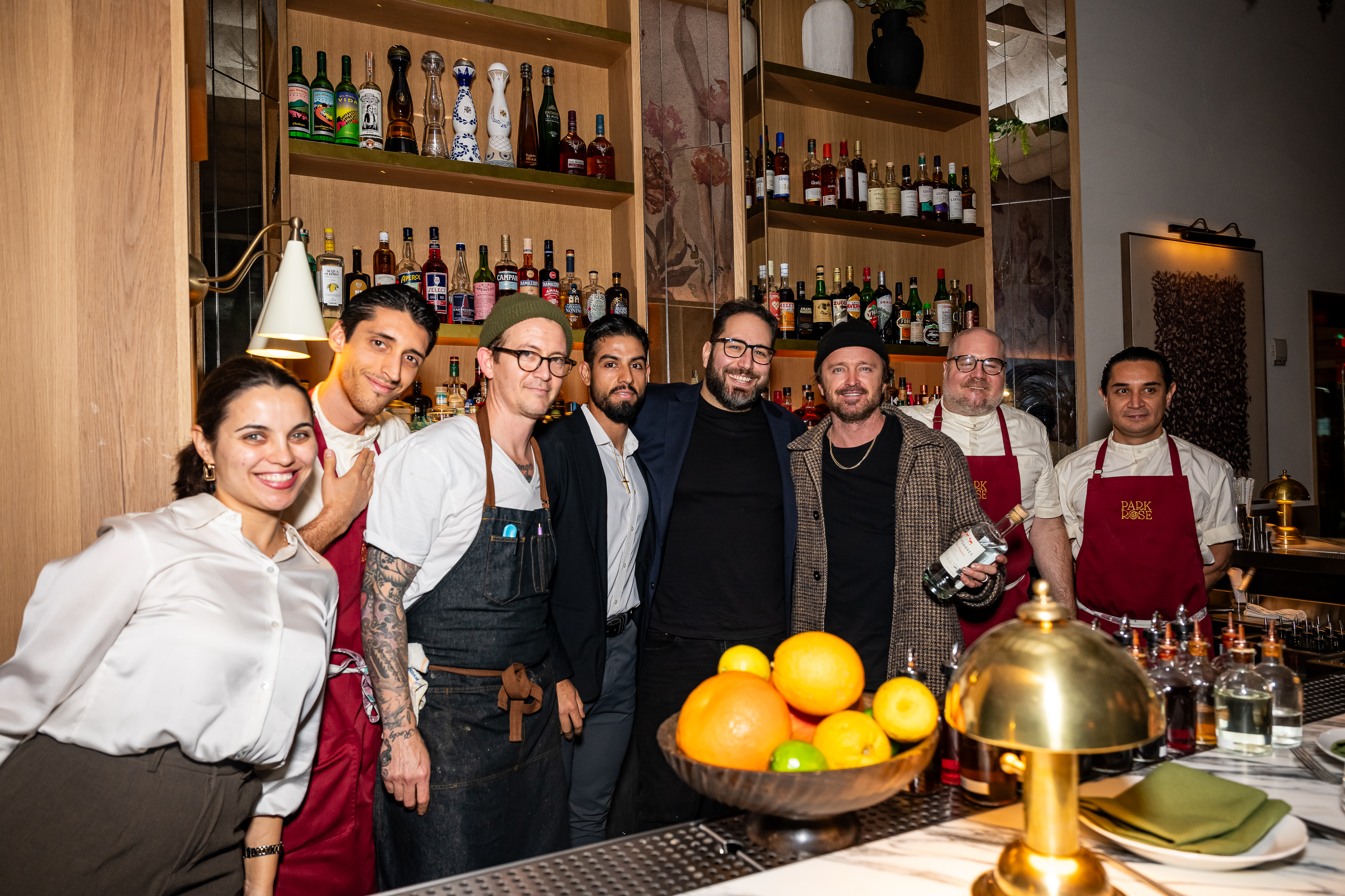 Aaron Paul got behind the bar at Park Rose inside Hotel Park Ave NYC to join the Renwick Hospitality Group team for a group shot on Wednesday, November 5.