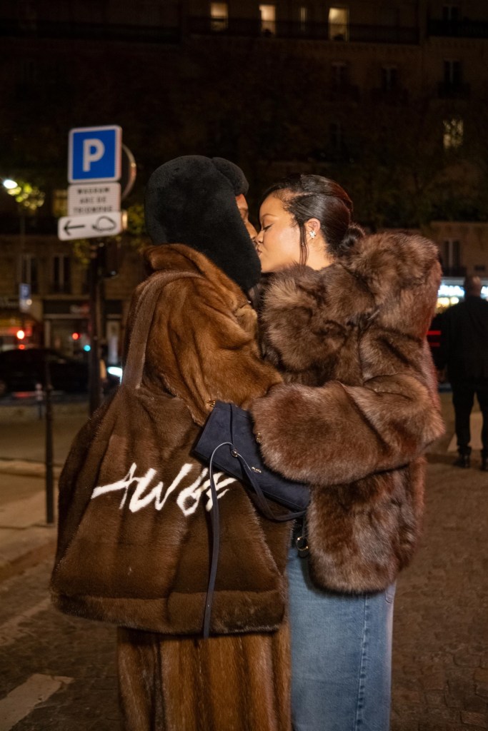 A$AP Rocky and Rihanna kissing in the streets of Paris.