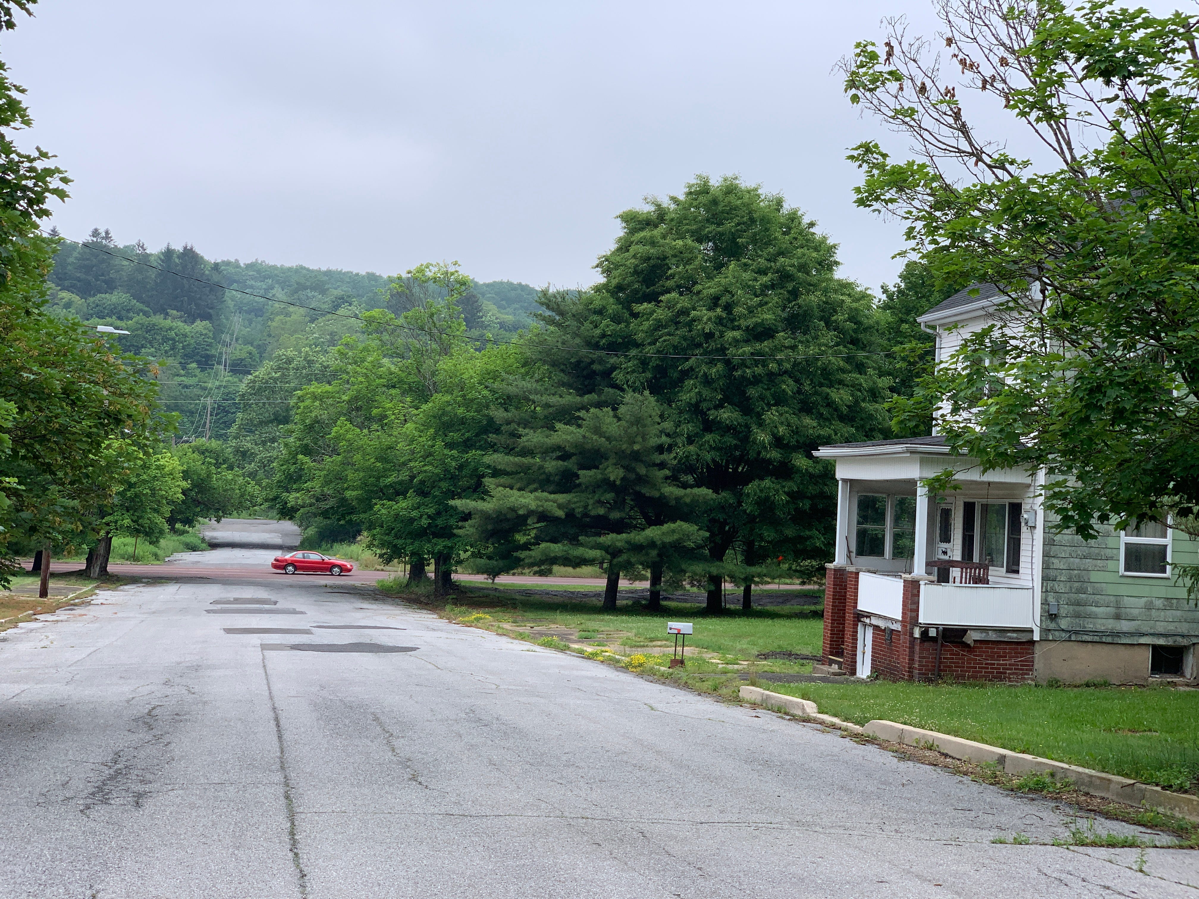 Harold Mervine's house sits alone on a street in Centralia, Pennsylvania, in 2022. The town once housed thousands of residents.