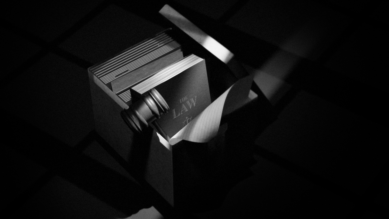 Black-and-white illustration of a legal handbook, notes, and a judge’s gavel in a cardboard box with the box’s lid leaning on the side