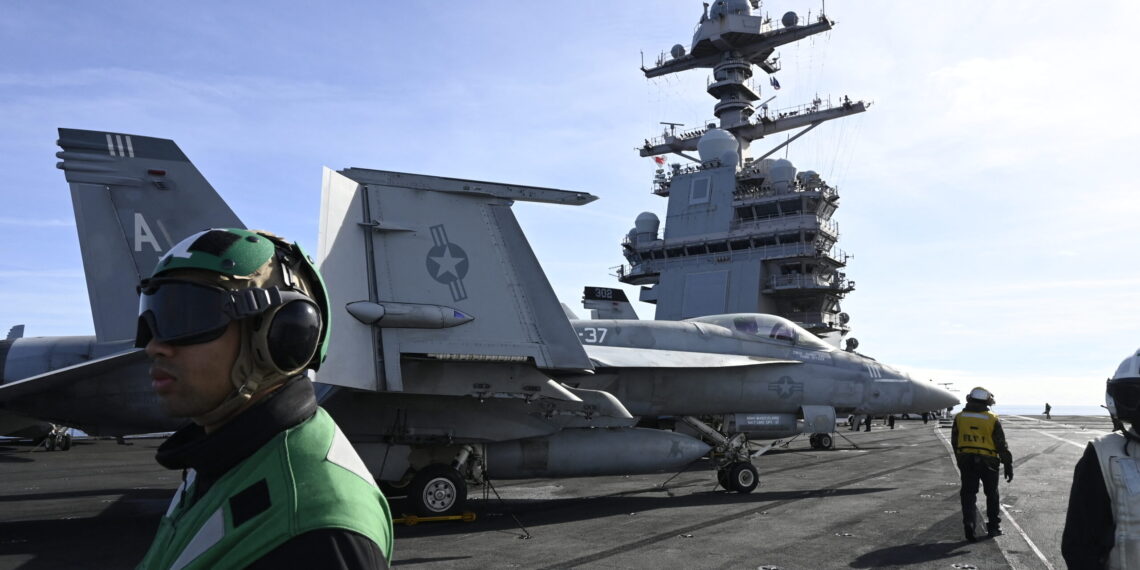 U.S. aircraft carrier nears Latin America as Venezuela tensions simmer