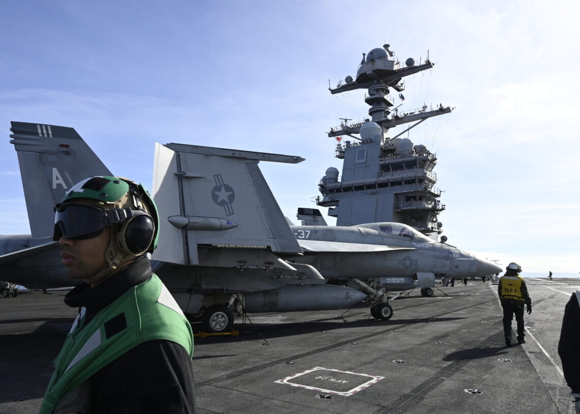 U.S. aircraft carrier nears Latin America as Venezuela tensions simmer