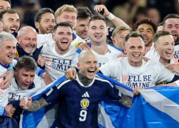 With a bicycle kick and a blast from midfield, Scotland heads to World Cup