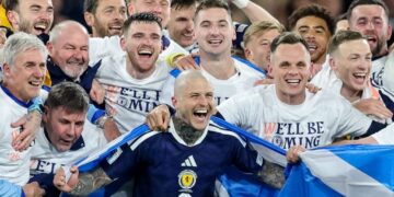 With a bicycle kick and a blast from midfield, Scotland heads to World Cup