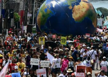 A Decade After the Paris Agreement, Climate Promises Still Leave the Poor Behind