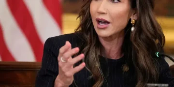 Noem pressed after blaming Biden for shooting suspect approved under Trump