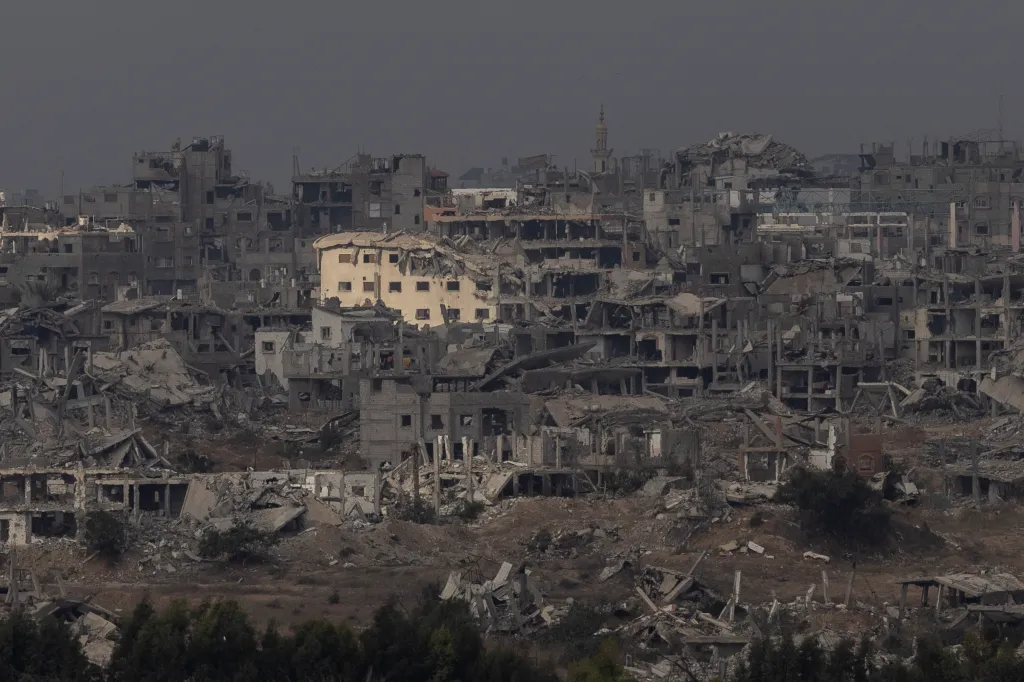 View of the Gaza Strip from the Israeli side of the border showing widespread destruction of buildings.