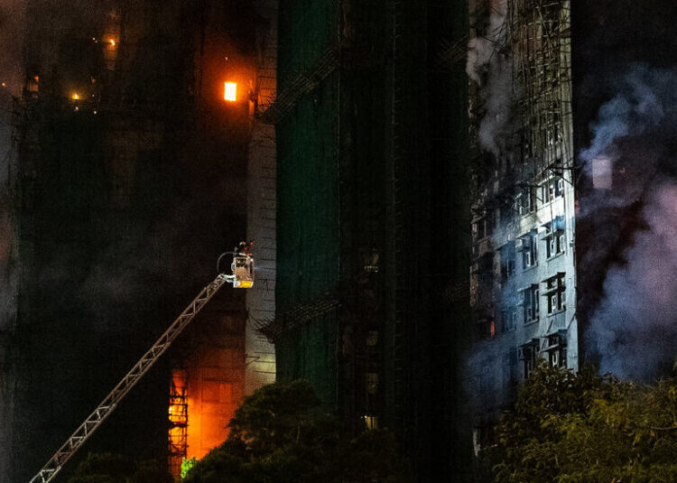 Three people tied to a construction company were arrested on suspicion of manslaughter.