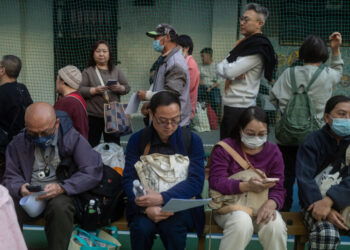 Mourners Line Up to Honor Victims of Hong Kong’s Deadliest Fire in Decades