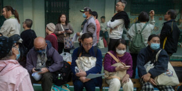 Mourners Line Up to Honor Victims of Hong Kong’s Deadliest Fire in Decades