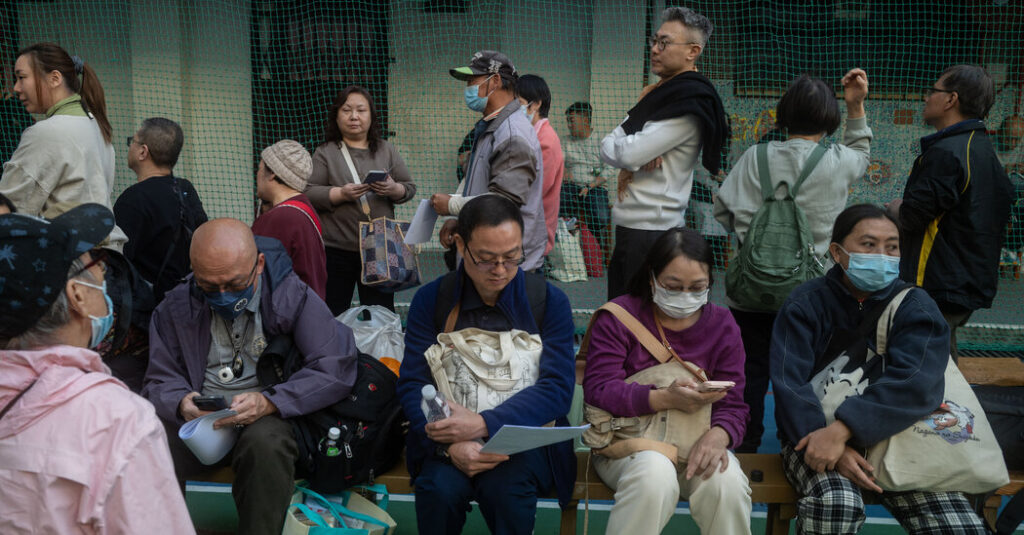 Mourners Line Up to Honor Victims of Hong Kong’s Deadliest Fire in Decades