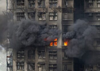 Death toll in Hong Kong high-rise fire rises to 55