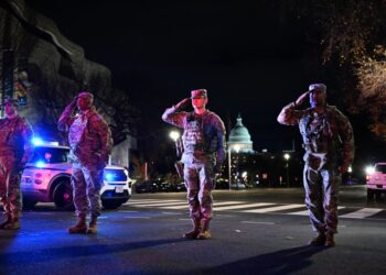 One Guard member dies of injuries; Trump threatens migration policy changes