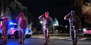 One Guard member dies of injuries; Trump threatens migration policy changes