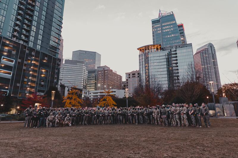 Just as they did in Chicago, at the famous Bean monument, Bovino's Border Patrol crew marked the end of its Charlotte mission by posing in front of its skyline.