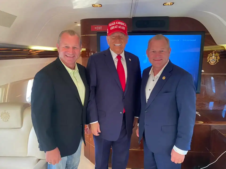 Trever Nehls (left) with President Donald Trump and his twin brother Rep. Troy Nehls aboard 
